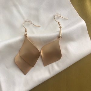 Gold leaf asymmetrical earrings